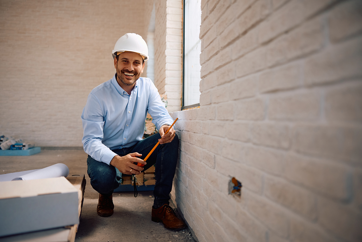 happy-construction-site-engineer-using-level-and-l-2026-01-06-10-28-06-utc 1 (1)